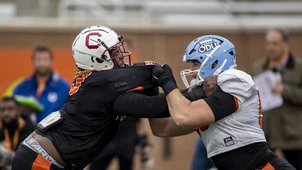 Feb 2, 2023; Mobile, AL, USA; American defensive lineman Zacch Pickens of South Carolina (3) spars with American offensive lineman Nick Saldiveri of Old Dominion (59) practices during the third day of Senior Bowl week at Hancock Whitney Stadium in Mobile. Mandatory Credit: Vasha Hunt-USA TODAY Sports